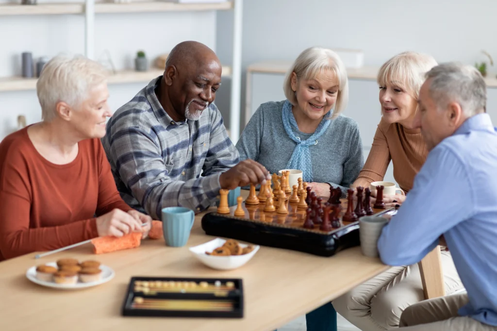 Senior residents enjoying dessert together at Franklin Johns Creek